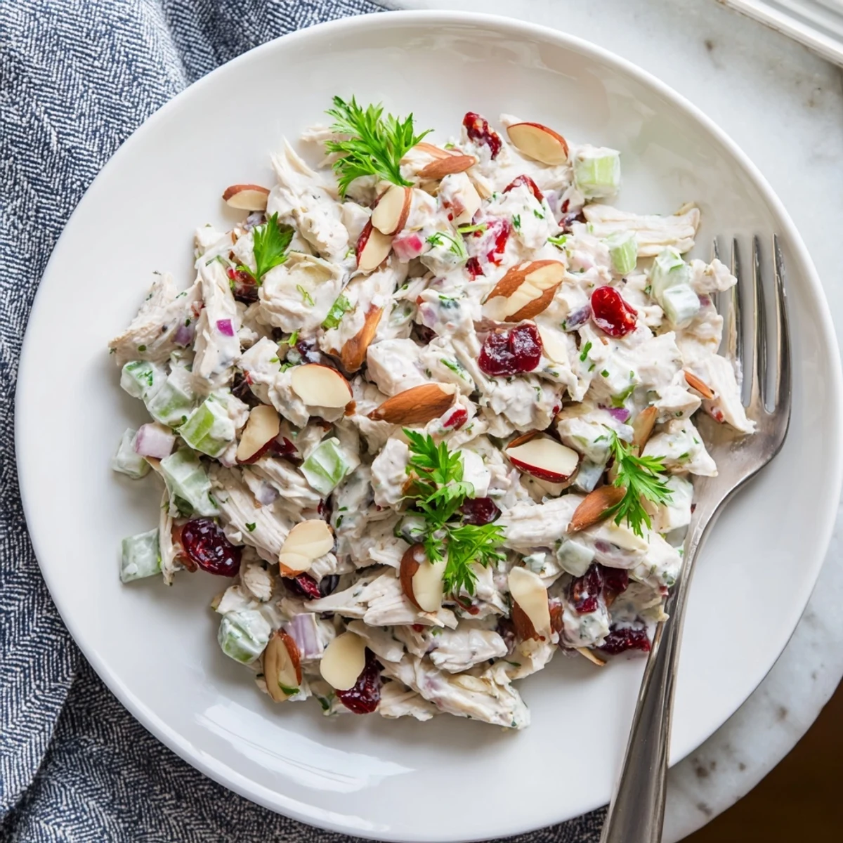 Creamy Greek yogurt rotisserie chicken salad loaded with crisp colorful vegetables and fresh herbs