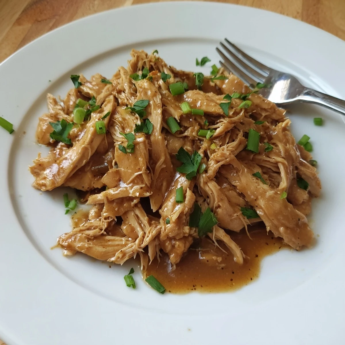 Slow Cooker Brown Sugar Garlic Chicken glazed, tender breasts steaming over fluffy rice.